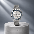MILAN — montre argentée, cadran clair et bracelet en maille